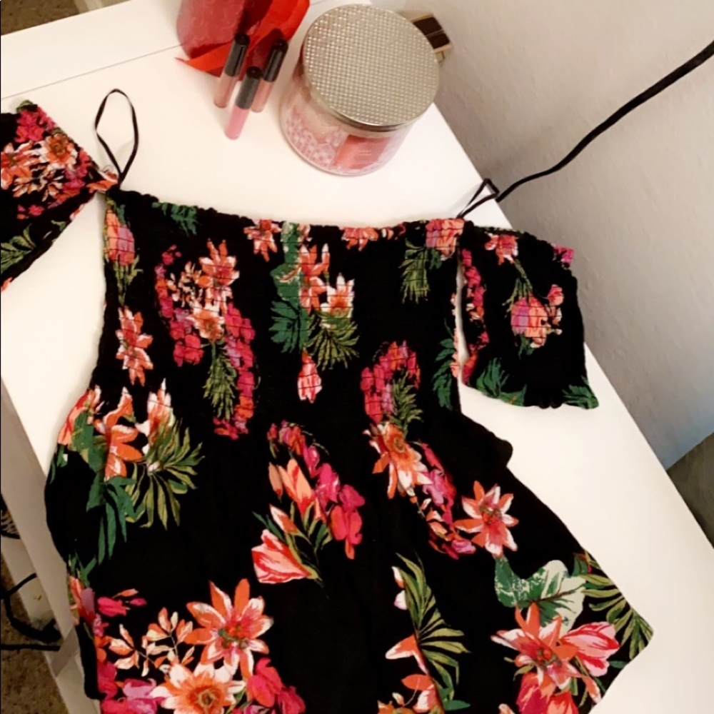 black crop with pink and orange flowers